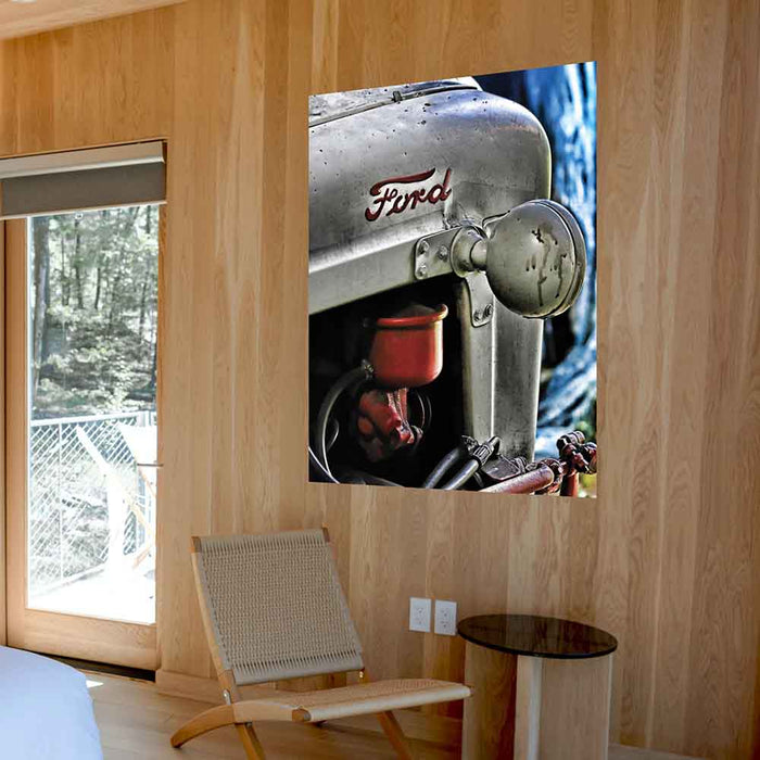 48x60 Ford Tractor Poster Displayed Above Chair