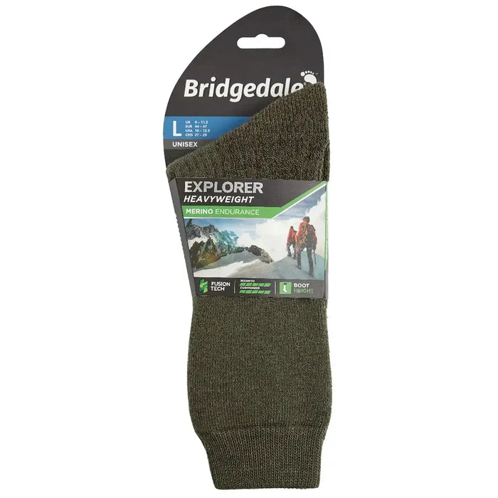 Packaged Bridgedale Explorer Merino Heavyweight Boot Sock - John Bull in green, featuring branding and product details for hiking and cold weather. from John Bull Clothing