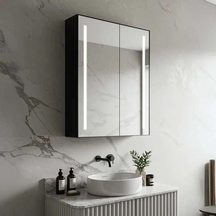 Matte black double door bathroom mirror cabinet with LED strip light and open glass shelves with toiletries - Glazonoid