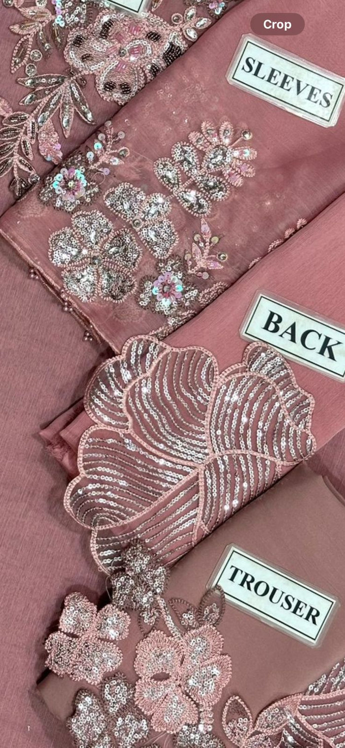 Elegant 3-piece mauve festive suit featuring delicate sequence work and matching dupatta.