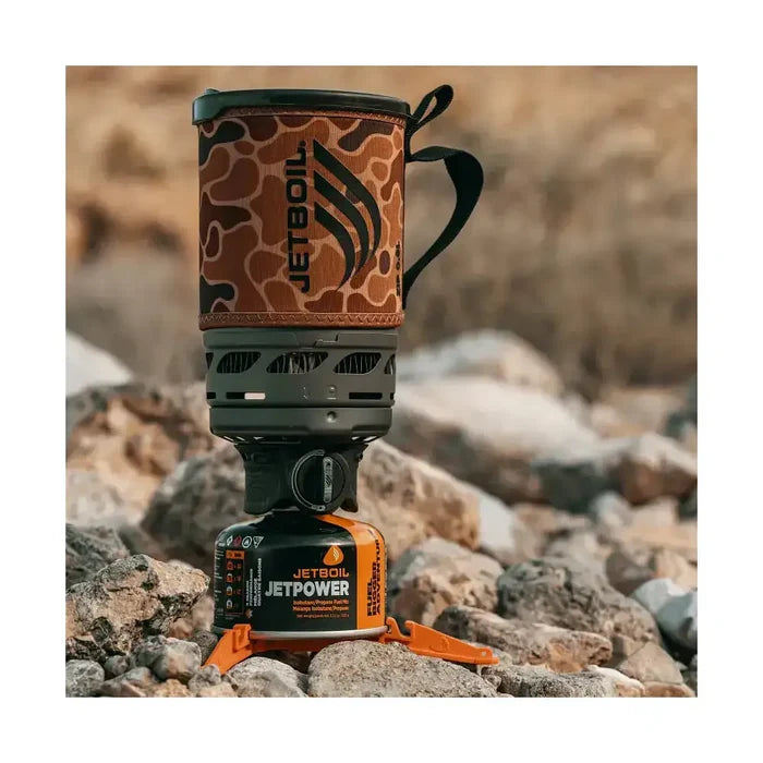 Jetboil Zip Duck Camo 0.8L camping stove set on rocks from John Bull Clothing