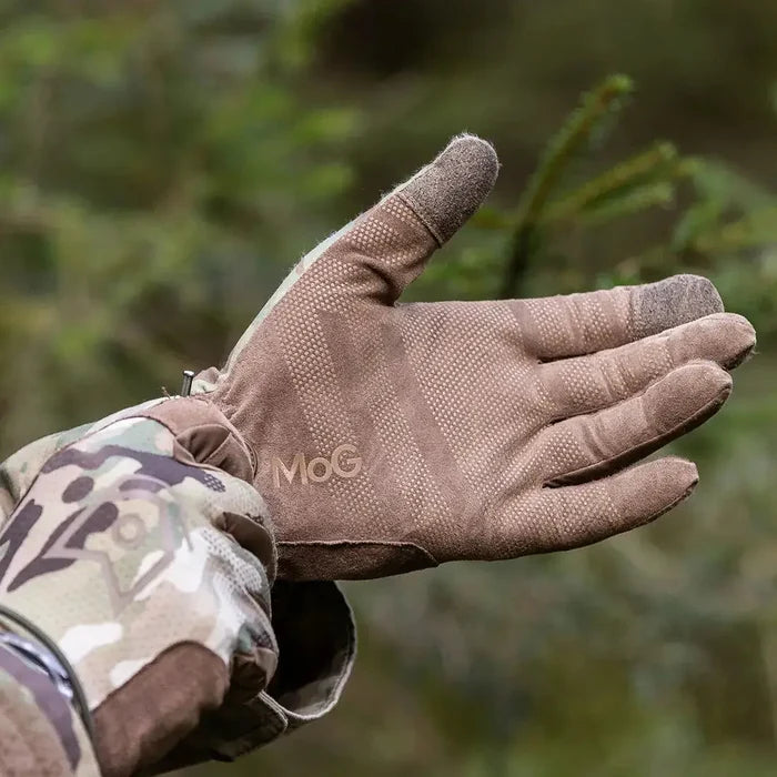 Close-up of MoG Target Light Duty Gloves Multicam palm grip in outdoor setting, emphasizing precision control and rugged construction for safety gear. from John Bull Clothing