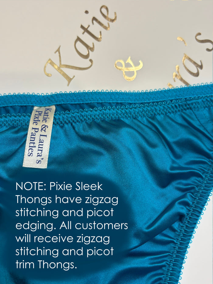 Peacock blue thong panties close-up with picot trim and zigzag stitching