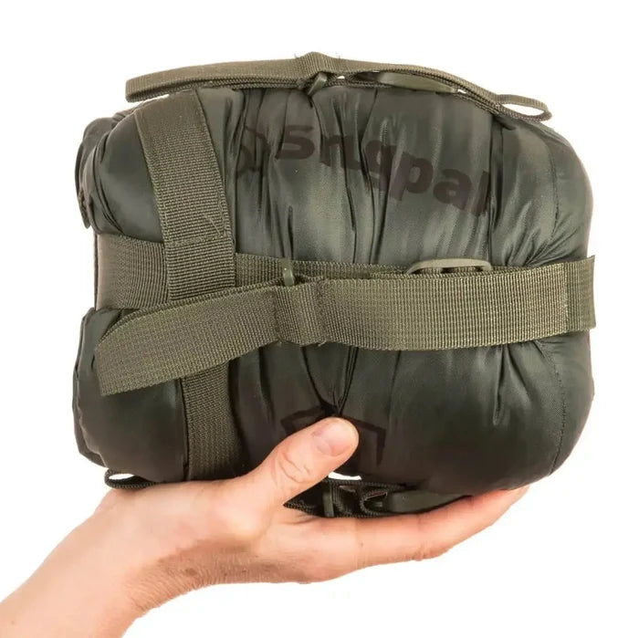 Compressed Snugpak Elite 1 Sleeping Bag Olive Green in stuff sack, compact and lightweight for easy transport on hiking trips. from John Bull Clothing