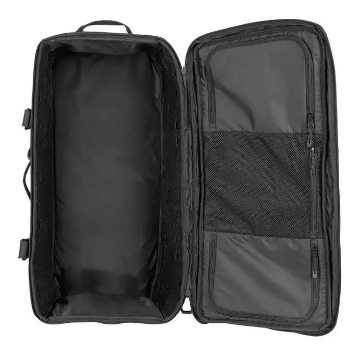 Stoirm 50L Black Duffel Bag fully opened, displaying a large main compartment with mesh zippered pockets for secure storage. from John Bull Clothing