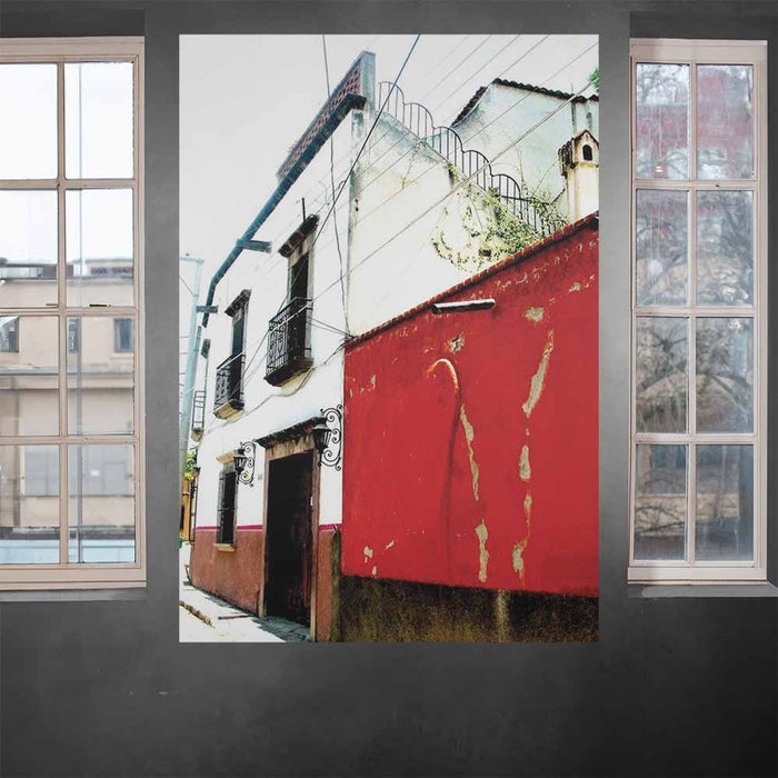 60 inch red and white Mexican House Architecture poster displayed on a wall between two windows