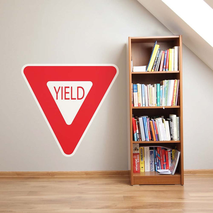 48 inch Yield Sign Wall Decal Installed Next to Bookcase