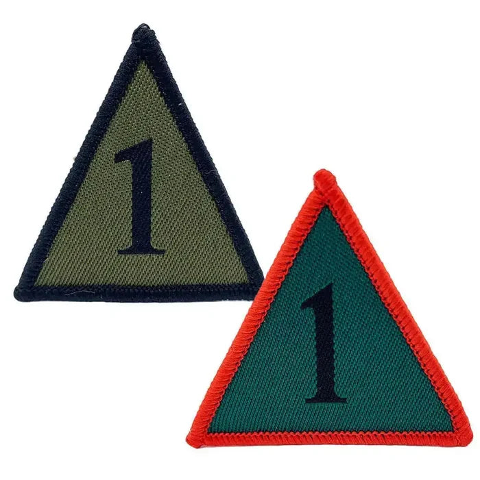 Two 1st Armoured Brigade TRF patches in subdued and red/green/black variants, iron or sew on, for military uniform customization.  from  John Bull Clothing