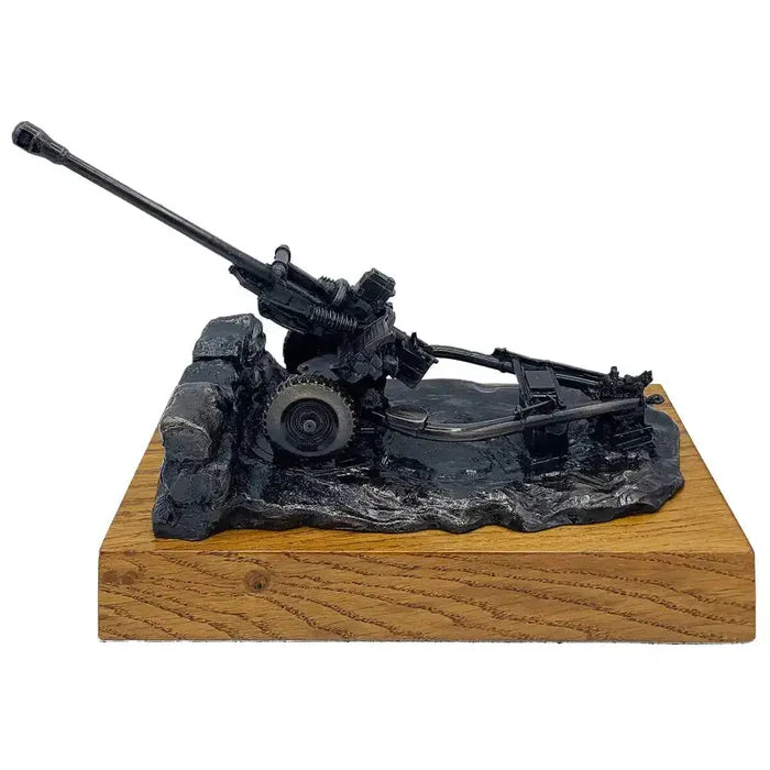 105mm Light Gun Bronze Resin Statue on rosewood base, detailed artillery sculpture from John Bull Clothing for military decor.  from  John Bull Clothing