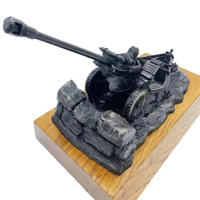 Angled top view of 105mm Light Gun Bronze Resin Statue highlighting craftsmanship and swivel gun barrel, from John Bull Clothing's decor range.  from  John Bull Clothing