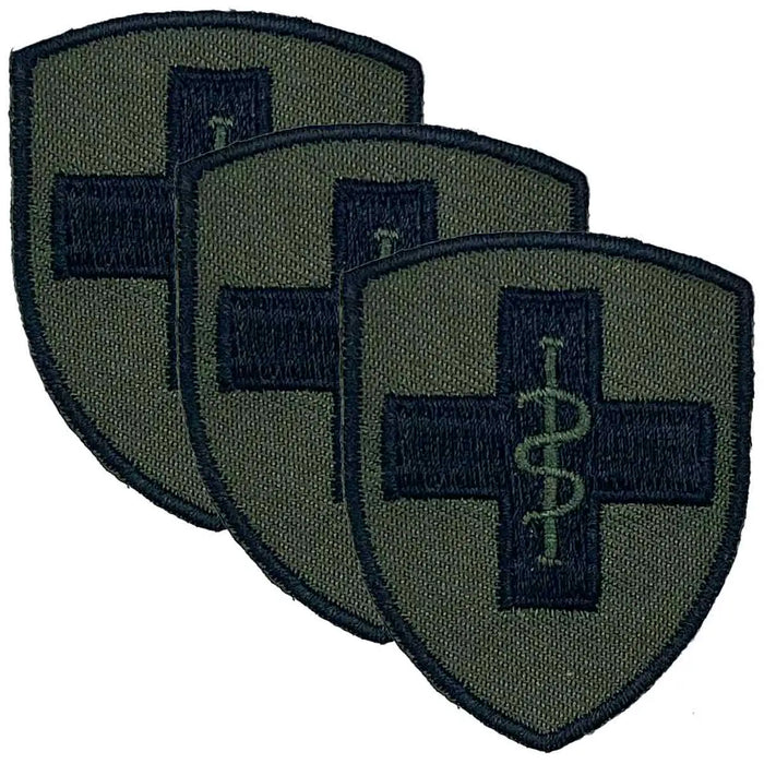 Set of three 2 Medical Brigade TRF patches with green background and black cross, ideal for military uniforms. Iron or sew-on cotton patches. 3 Pack from  John Bull Clothing