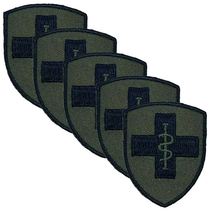 Pack of five 2 Medical Brigade TRF iron or sew-on patches in green and black, designed for military uniform identification. 5 Pack from  John Bull Clothing