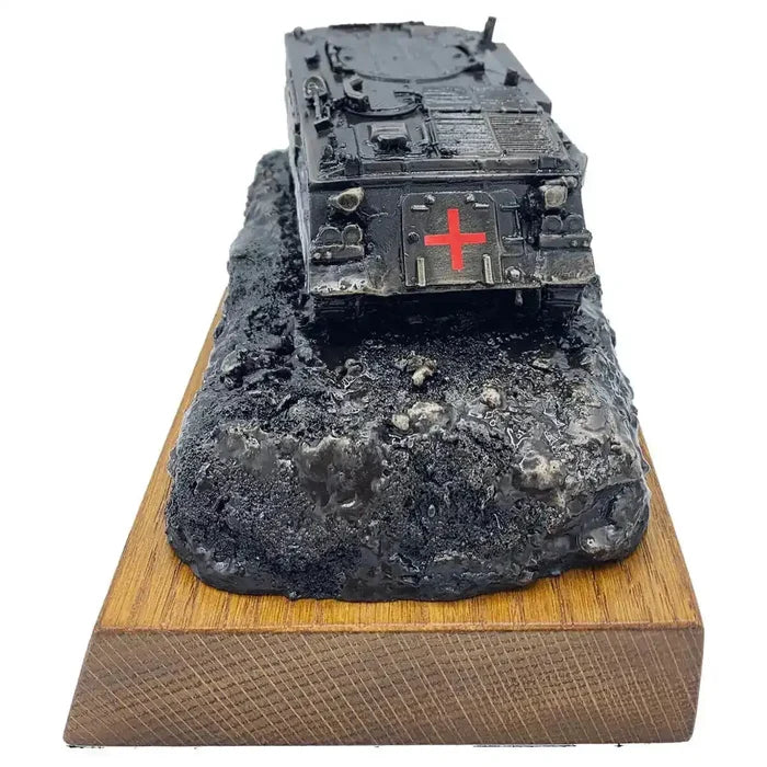 Front view of 432 Ambulance Personnel Carrier Bronze Statue with red cross emblem, mounted on textured terrain and wooden base.  from  John Bull Clothing