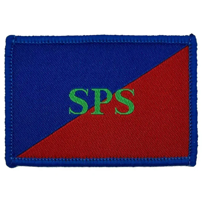 Single Adjutant Generals Corps SPS TRF patch with regulation red and blue background and green SPS lettering, 6x4cm in size. 1 Flash from  John Bull Clothing