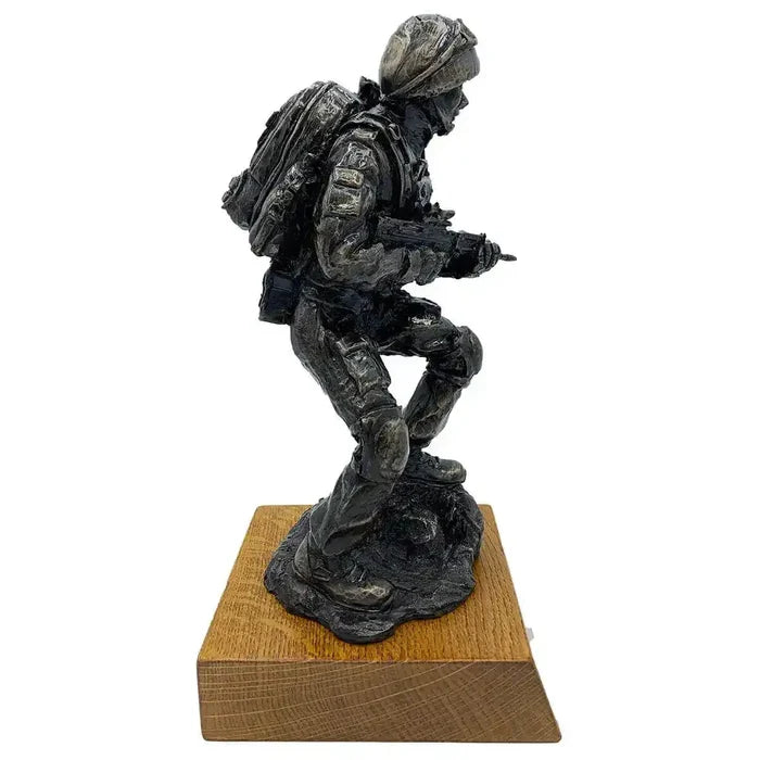 Right profile of Afghan Medic Bronze Resin Statue with SA80 and combat gear, crafted in bronze resin for realistic army tribute decor.  from  John Bull Clothing