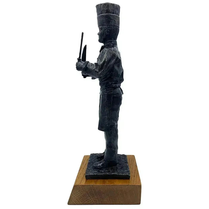 Side profile of Army Chef Statue Bronze Resin | John Bull Clothing showing detailed chef uniform and utensils, ideal for military-themed decor.  from  John Bull Clothing