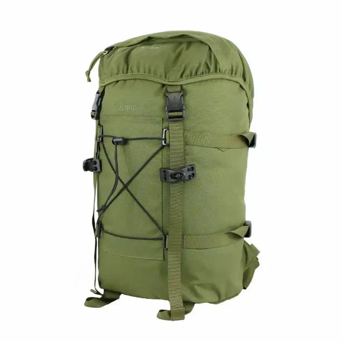 Side view of green Berghaus Munro II IR Tactical Daysack showing compression straps and durable 1000D Armadura fabric construction.  from  John Bull Clothing