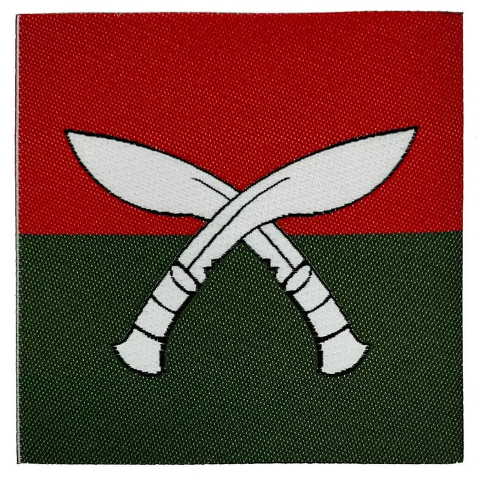 Single Brigade of Gurkhas Nepal TRF patch featuring red and green background with white crossed kukris, ideal for iron or sew-on use.  from  John Bull Clothing