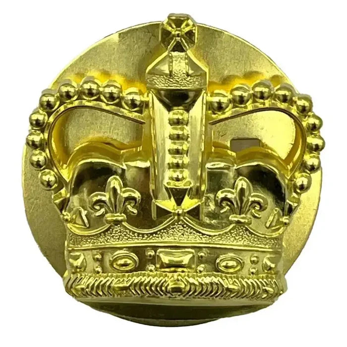 Regulation British Army WO2 Brass Crown with backing plate, showcasing a high-quality brass construction. Designed for military uniforms with a split pin fitting. Queens Crown from  John Bull Clothing