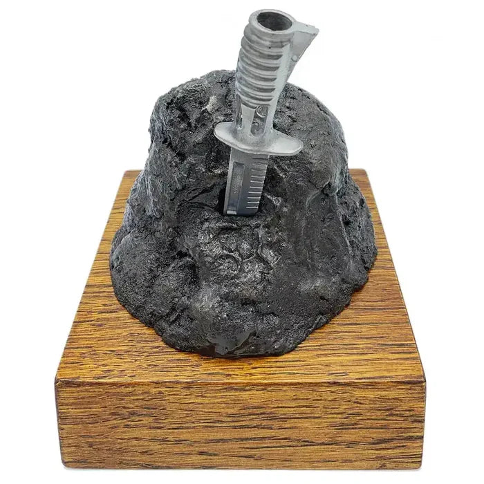 Bronze Resin Bayonet in the Rock Presentation by John Bulls, featuring a realistic bayonet embedded in textured rock on a solid oak base.  from  John Bull Clothing