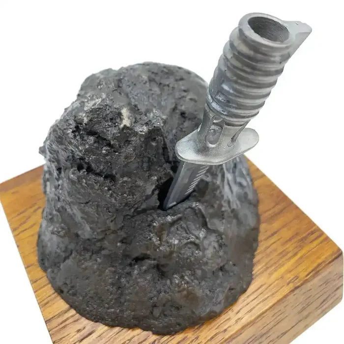Close-up of Bronze Resin Bayonet in the Rock Presentation, showing intricate bayonet handle detail and textured rock surface on oak base.  from  John Bull Clothing