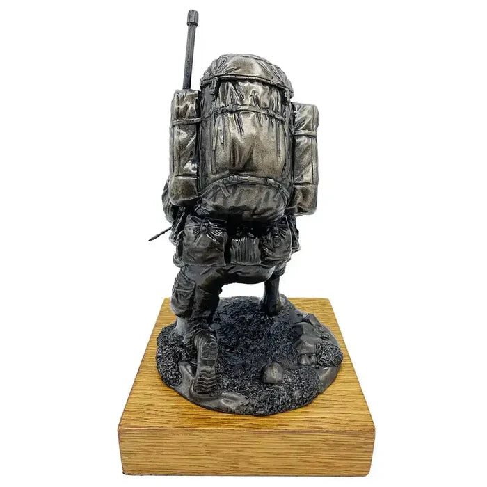 Rear view of Bronze Resin Kneeling Signaller Statue showing full bergen and radio antenna detail on oak base | John Bull Clothing  from  John Bull Clothing