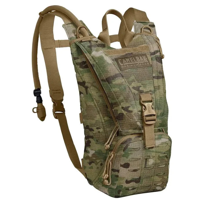 Camelbak Ambush 3L Mil Spec Crux Short Hydration Pack in multicam, built for military and outdoor enthusiasts with a durable, tactical design and 3L reservoir. Multicam from  John Bull Clothing