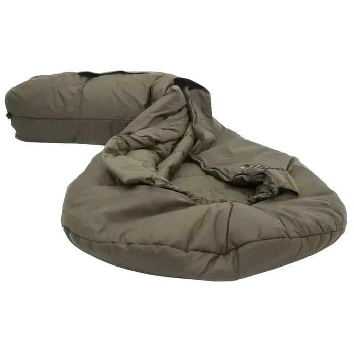 Carinthia Defence 4 Sleeping Bag Olive Green, partially unzipped to reveal its insulated interior, designed for cold-weather camping and hiking. Green from  John Bull Clothing