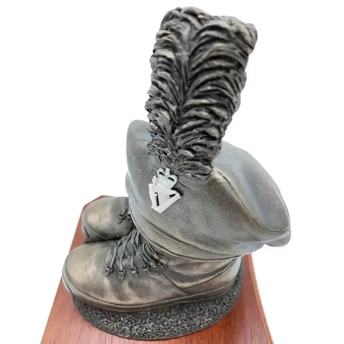 Close-up of Caubeen and Boots Bronze Resin Statue with Irish military insignia and feather detail, perfect for collectors.  from  John Bull Clothing