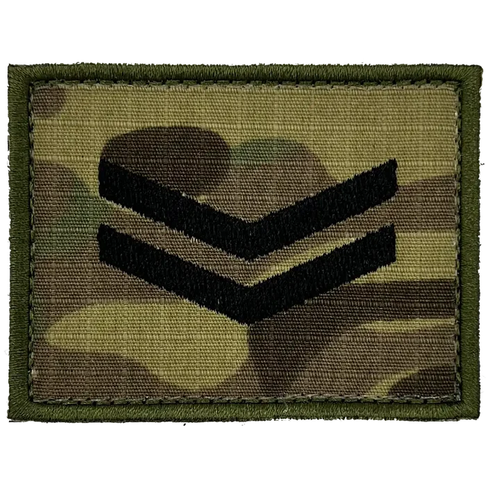 Front view of camouflage military rank patch with black chevrons Corporal from  John Bull Clothing