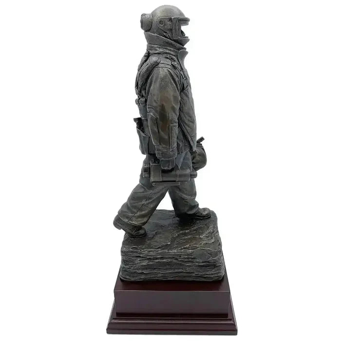Right side view of EOD Long Walk Bronze Resin Statue showing the operator carrying a bag, crafted in bronze resin for home or office display.  from  John Bull Clothing