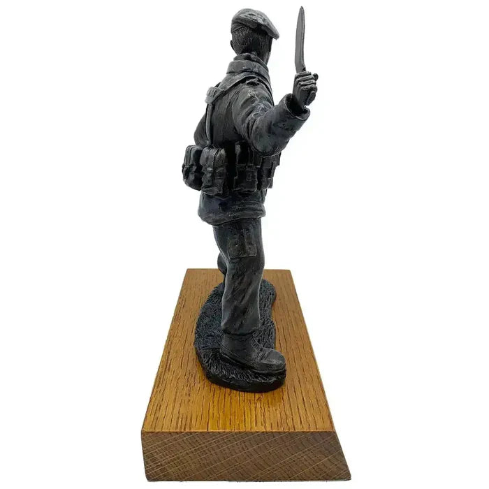 Left profile of Gurkha with Kukri bronze resin statue showcasing the raised kukri and tactical attire, a striking piece for collectors of military art.  from  John Bull Clothing