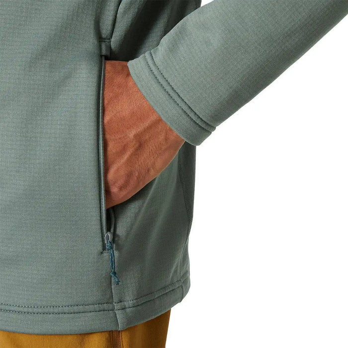 Close-up of the Helly Hansen Versalite Hooded Fleece Jacket's zippered side pocket, showcasing secure storage and durable stitching.  from  John Bull Clothing