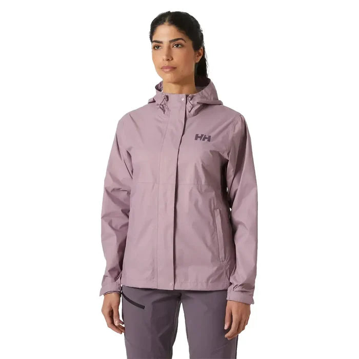 Model wearing Helly Hansen Womans Loke 2.0 Waterproof Jacket in purple, demonstrating fit and outdoor-ready style.  from  John Bull Clothing