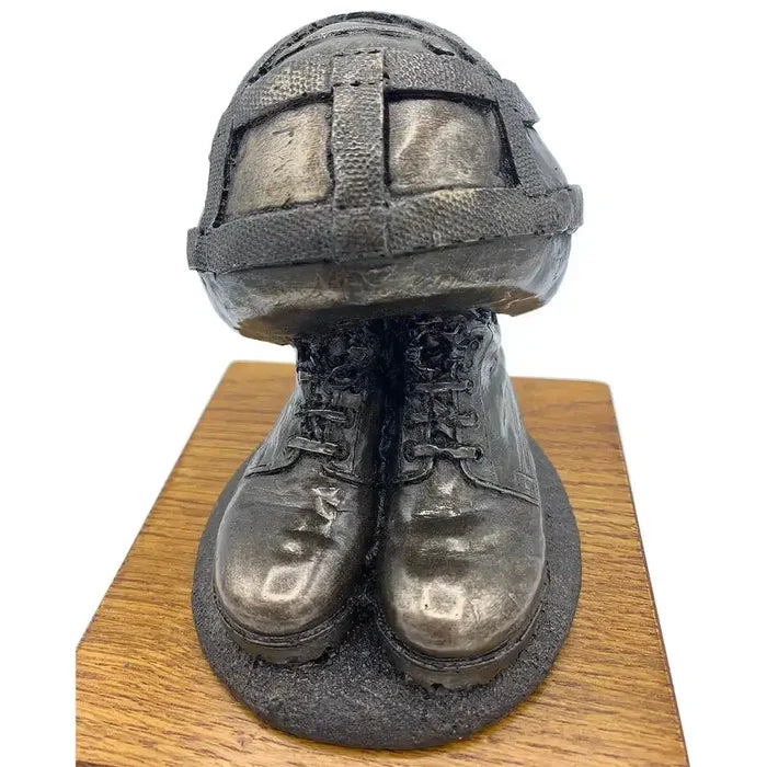 Close-up front of Helmet & Boots Statue Bronze Resin | John Bull Clothing, emphasizing lifelike boot laces and helmet detail.  from  John Bull Clothing