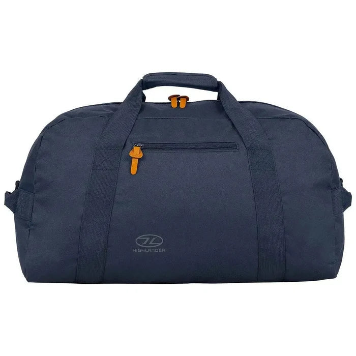 Highlander Cargo 45L Holdall Bag in navy blue with durable polyester material, dual handles, and a front zip pocket for secure storage. Denim Blue from  John Bull Clothing