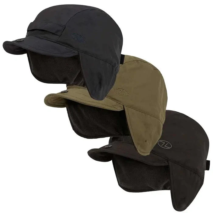 Highlander Dry Tech Mountain Waterproof Hat in black, olive, and brown colors with ear flaps and fleece lining for cold, wet conditions.  from  John Bull Clothing