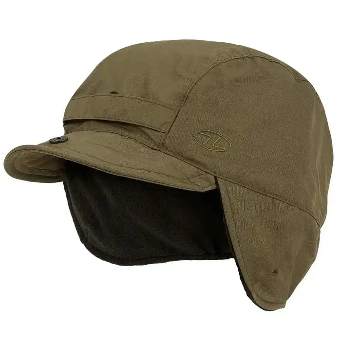 Olive Highlander Dry Tech Mountain Waterproof Hat featuring Ab-Tex coating and thermal fleece lining for all-weather protection. Green from  John Bull Clothing