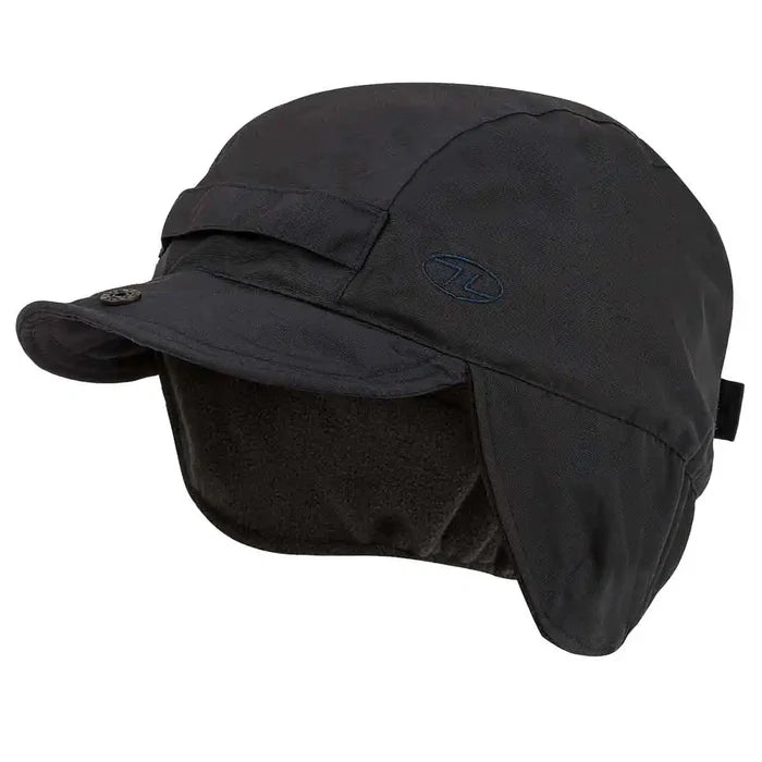 Dark navy Highlander Dry Tech Mountain Waterproof Hat with ear coverage and water-resistant nylon shell for mountain activities. Blue from  John Bull Clothing