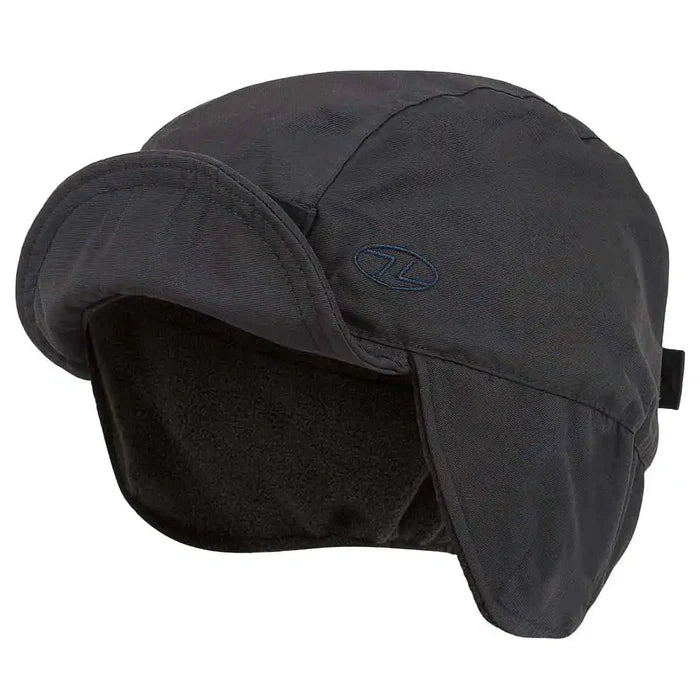 Side view of navy Highlander Dry Tech Mountain Waterproof Hat showing fleece interior and extended ear flaps for warmth.  from  John Bull Clothing
