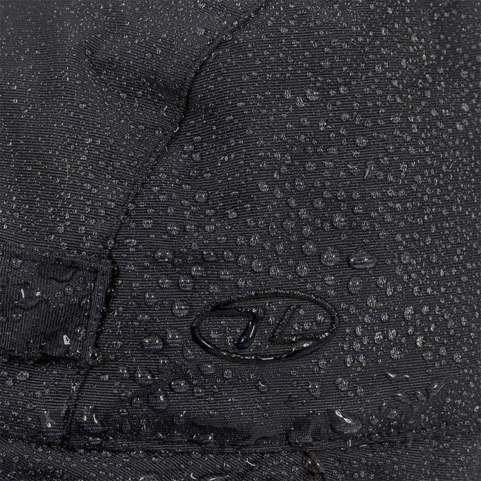 Close-up of water droplets on Highlander Dry Tech Mountain Waterproof Hat's Ab-Tex coated nylon fabric, showcasing waterproof performance.  from  John Bull Clothing
