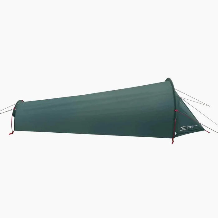 Angled side view of Highlander Falcon Bivvy Tent Pine Green showcasing its tapered, low-profile structure for wind resistance.  from  John Bull Clothing
