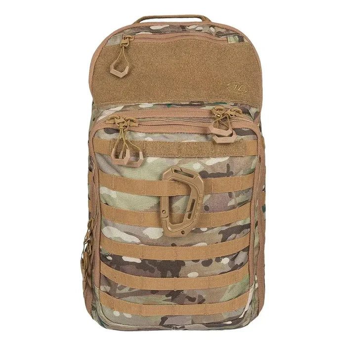 Highlander Harrier 25L Clamshell Rucksack in camouflage pattern with MOLLE webbing and tactical design, ideal for outdoor and urban use. HMTC from  John Bull Clothing