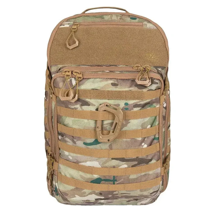 Highlander Harrier 35L Full Clamshell Pack in camouflage pattern, featuring MOLLE webbing, multiple compartments, and a tactical carabiner clip. HMTC from  John Bull Clothing