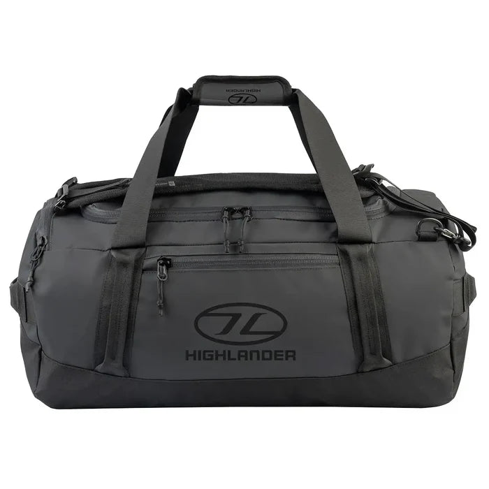 Highlander Hauler Duffel Bag in black with grey details, made from tough 600D PVC material, perfect for travel, sports, and outdoor use. 45 litre from  John Bull Clothing