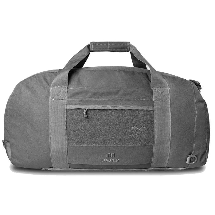 Highlander Loader 100L Holdall Bag Gen2 in grey, featuring a durable design with reinforced handles and a front zippered pocket for secure storage. Dark Grey from  John Bull Clothing