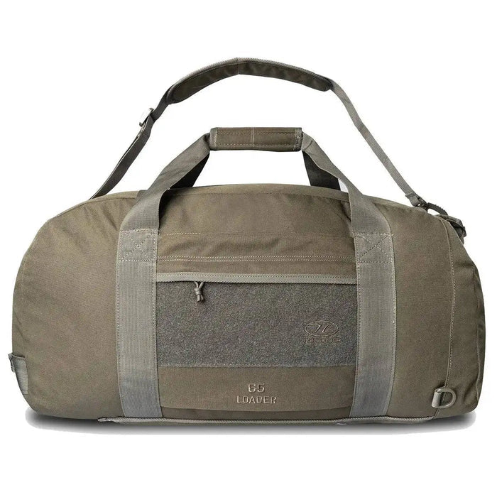 Highlander Loader 65L Holdall Bag Gen2 in olive green featuring a detachable shoulder strap, sturdy handles, and a spacious main compartment for gear.  from  John Bull Clothing