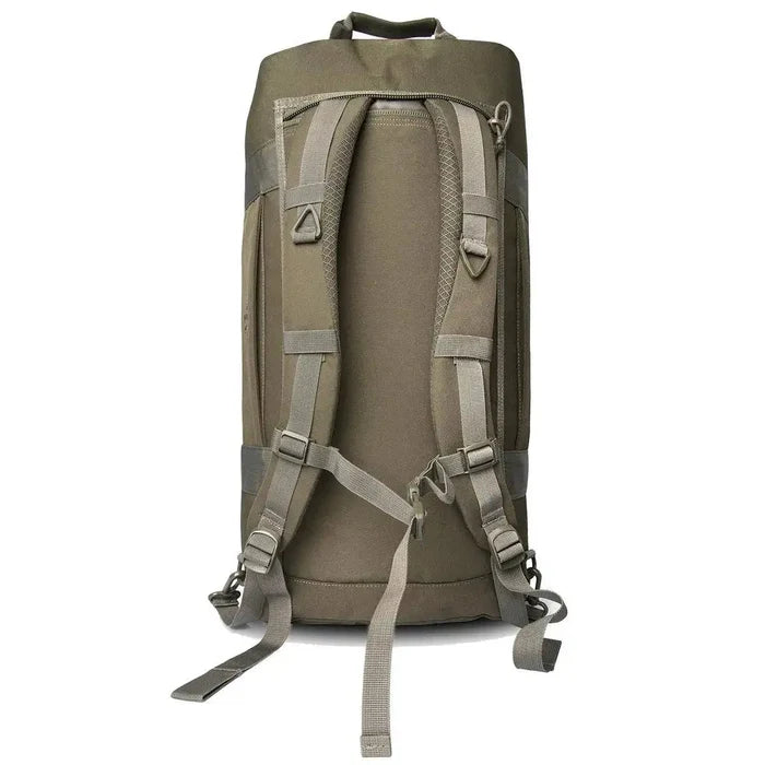 Highlander Loader 65L Holdall Bag Gen2 in olive green shown in a vertical position with adjustable backpack straps for versatile carrying options.  from  John Bull Clothing
