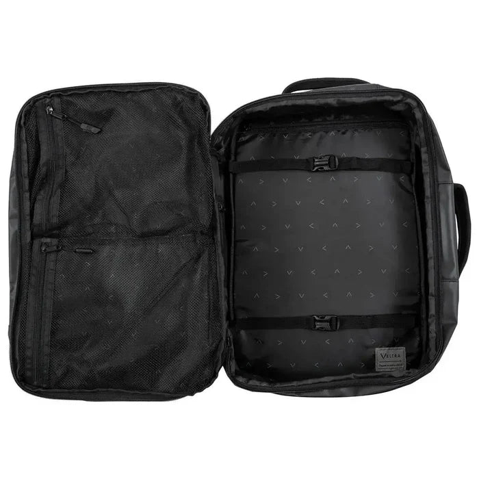 Fully opened Highlander Veltra 44L Cabin Bag Black revealing organized storage space with compression straps and zippered mesh pockets.  from  John Bull Clothing