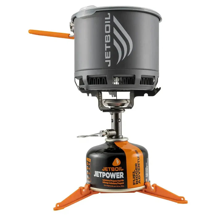Jetboil Stash Carbon Camping Stove fully assembled with pot, burner, and fuel canister, ideal for ultralight outdoor cooking adventures.  from  John Bull Clothing